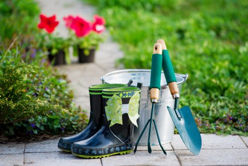 High-visibility clothing and protective gloves laid out before a garden task